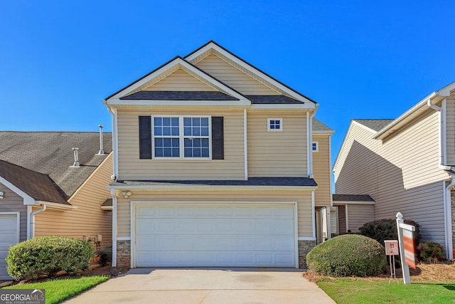 view of front of home with a garage