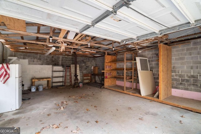 garage with white refrigerator