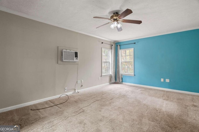 carpeted spare room featuring a wall mounted air conditioner, a textured ceiling, ceiling fan, and ornamental molding