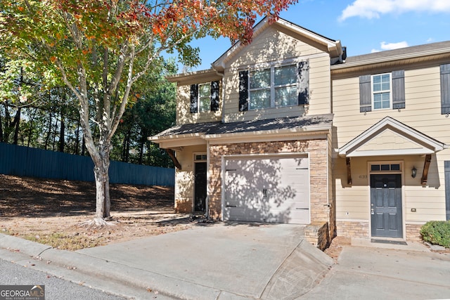 front of property with a garage