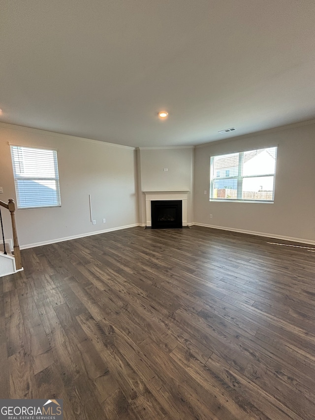 unfurnished living room with dark hardwood / wood-style floors