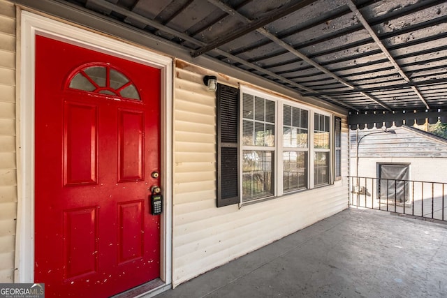 property entrance with a porch