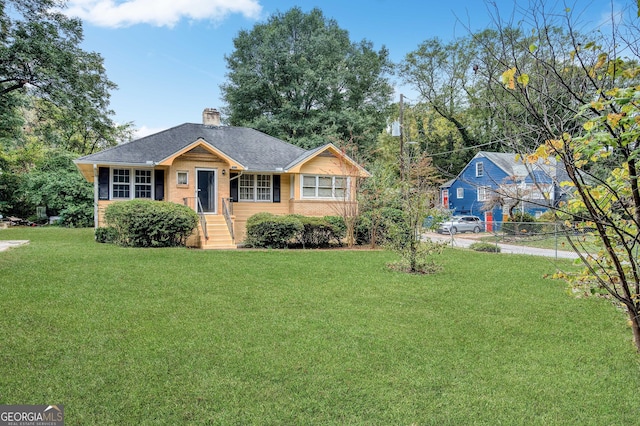 1778 Campbellton Rd SW, Atlanta, GA 30311 - ranch-style house featuring a front lawn, a chimney, roof with shingles, and brick siding