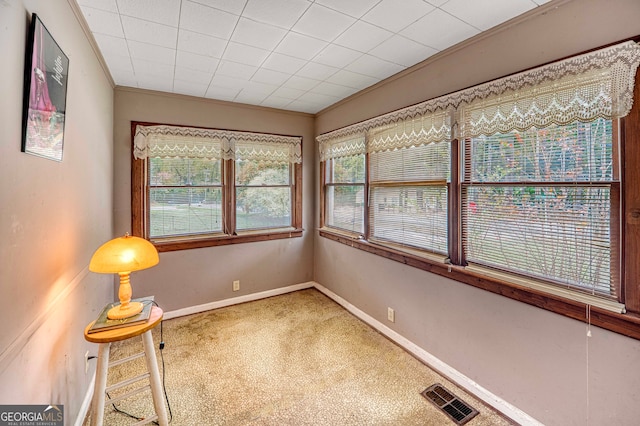 unfurnished sunroom featuring a wealth of natural light