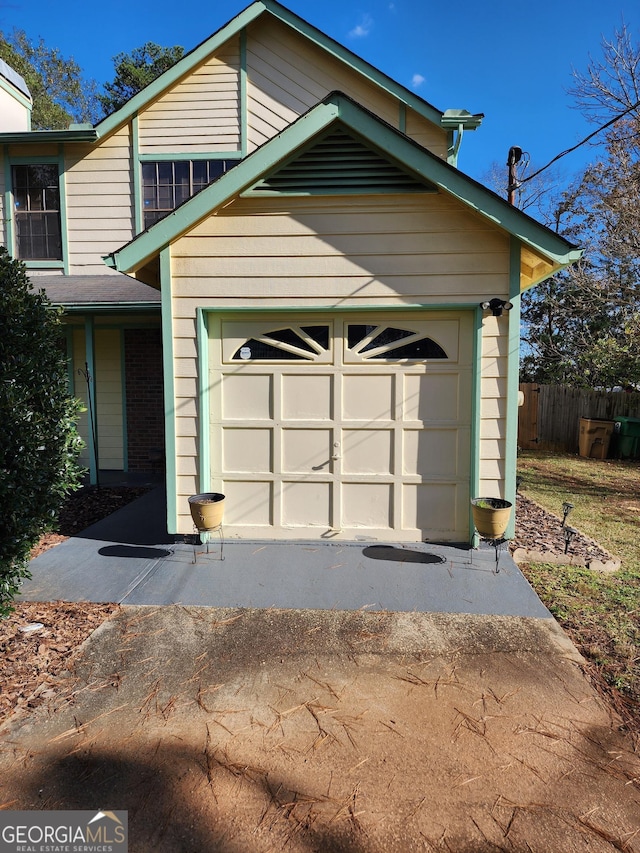 6722 Bent Creek Dr, Rex, GA 30273 - view of front of home featuring a garage and driveway