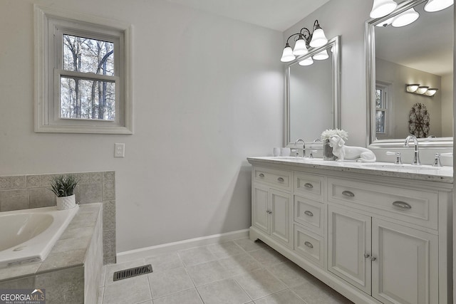 bathroom featuring tile patterned floors and vanity