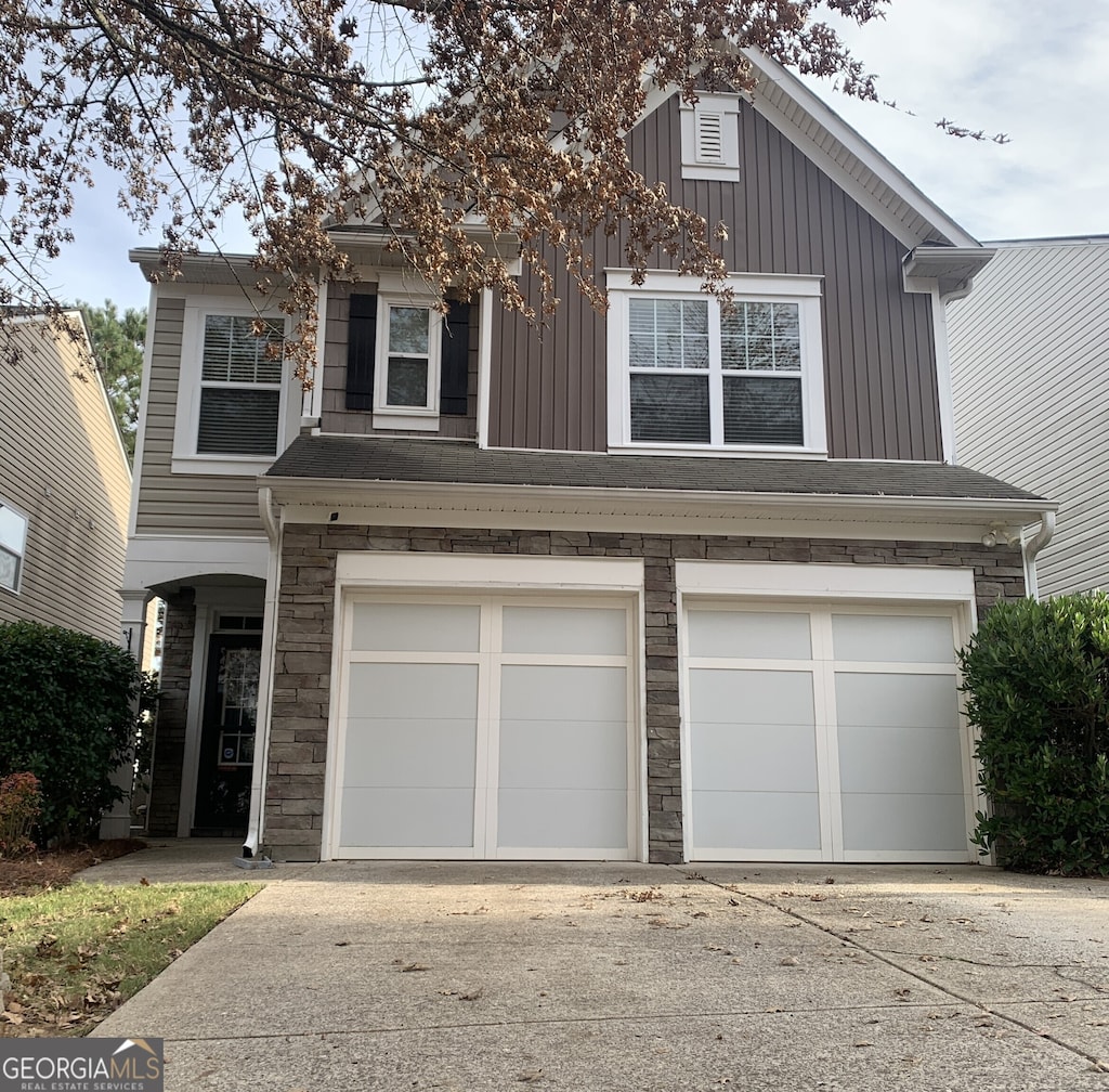 view of front of property featuring a garage