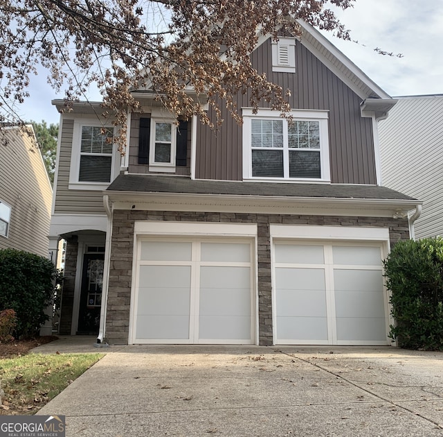 view of front of property featuring a garage