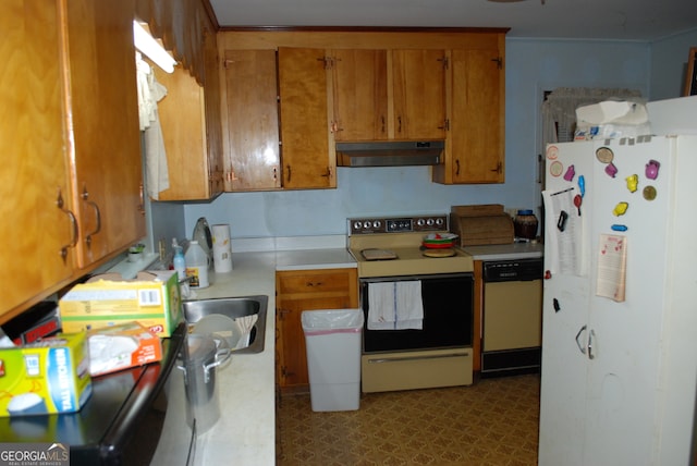 kitchen with white appliances and sink