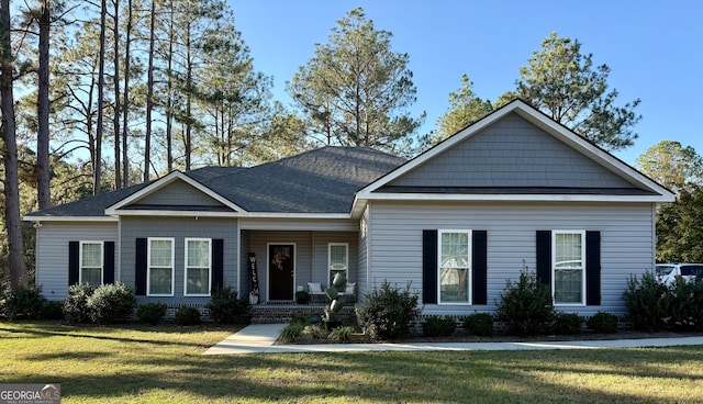 view of front of home with a front yard