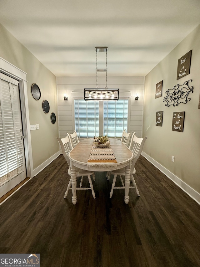 dining room with dark hardwood / wood-style floors