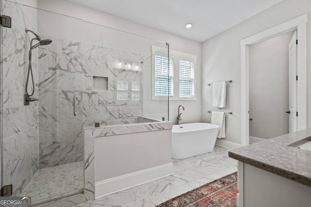 bathroom featuring shower with separate bathtub and vanity