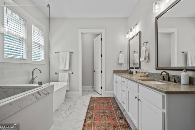 bathroom featuring a bathing tub and vanity