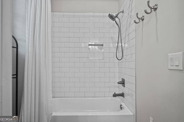 bathroom with shower / tub combo with curtain