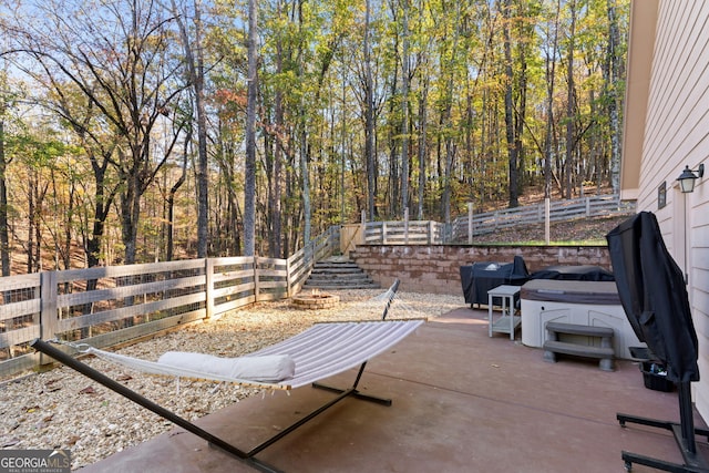 view of patio featuring a hot tub