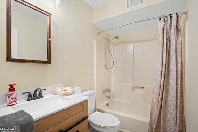 full bathroom featuring shower / bathtub combination with curtain, vanity, and toilet