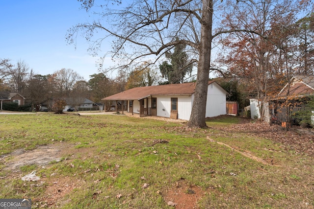 exterior space with a front yard