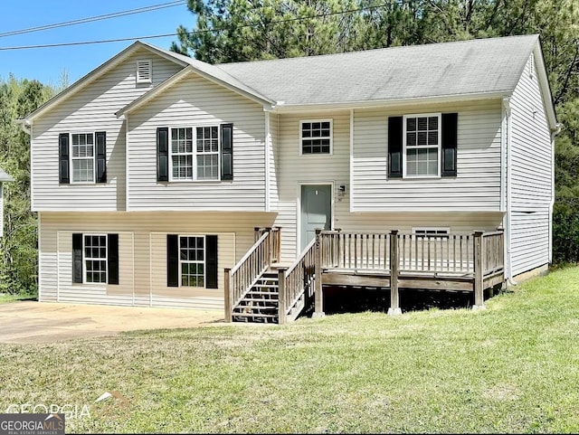 raised ranch featuring a front yard