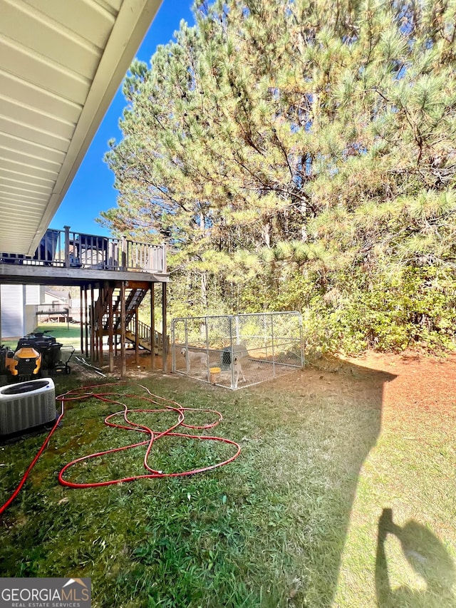 view of yard with central AC