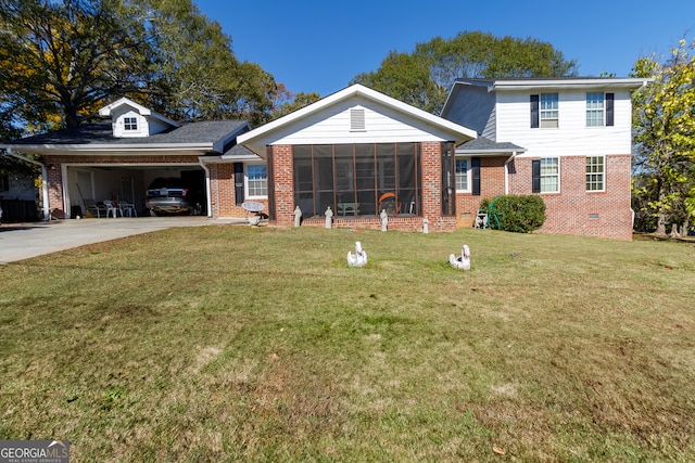 view of front facade featuring a sunroom, a front lawn, and a carport