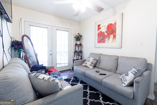 living room featuring ceiling fan, a wealth of natural light, and french doors