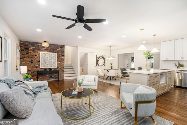 living room with dark hardwood / wood-style floors and ceiling fan