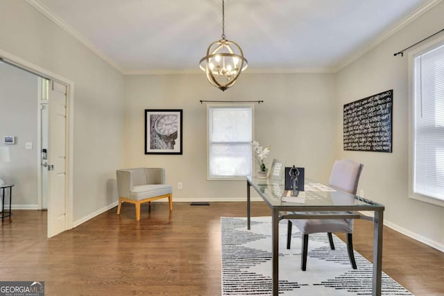 home office featuring dark hardwood / wood-style floors, crown molding, and a chandelier