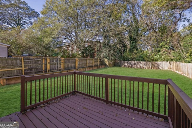 wooden deck with a yard