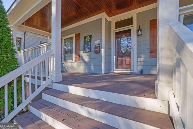 entrance to property with covered porch