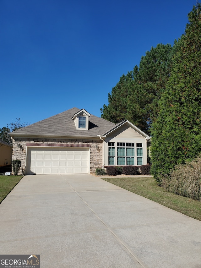 ranch-style home with a garage