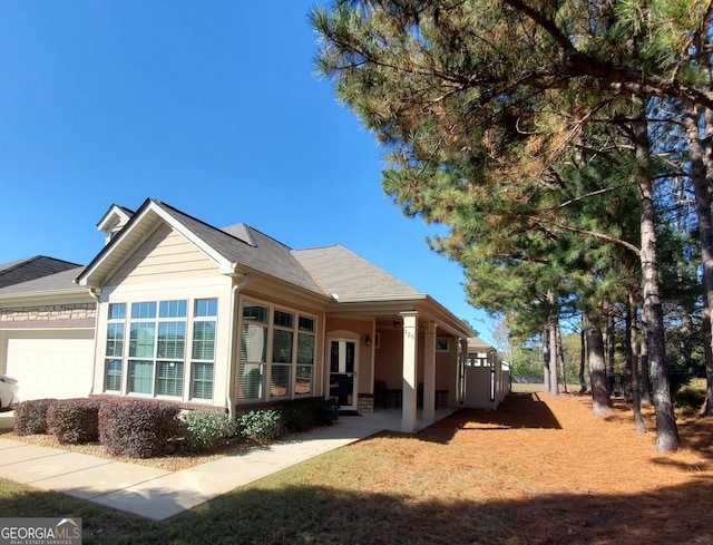 view of home's exterior featuring a garage