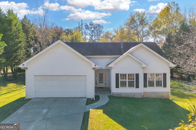 ranch-style house featuring a garage and a front yard