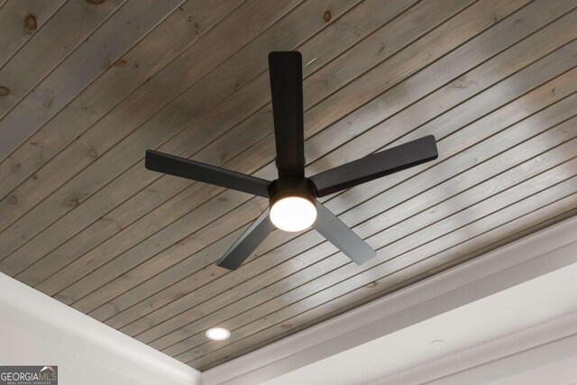 interior details with wooden walls and wooden ceiling