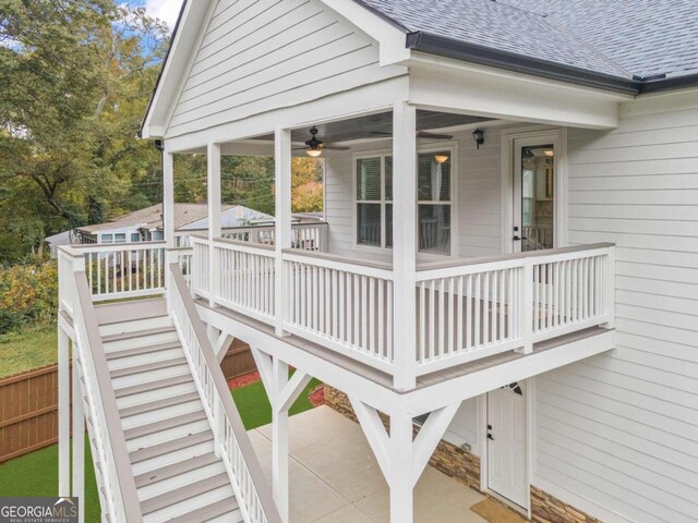 wooden deck with ceiling fan