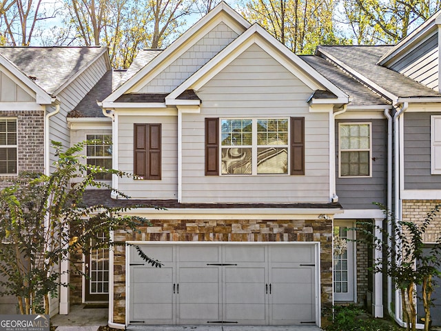 view of front of home with a garage