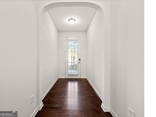 doorway featuring dark hardwood / wood-style flooring