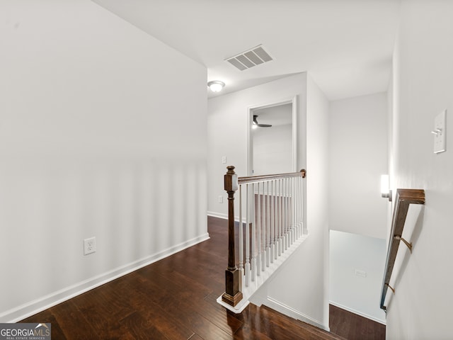 stairway featuring hardwood / wood-style flooring