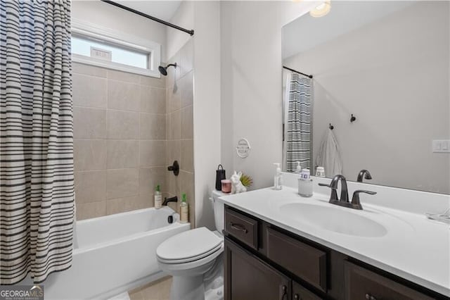 full bathroom with shower / bath combo, toilet, and vanity