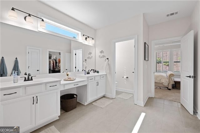 bathroom featuring vanity and tile patterned floors