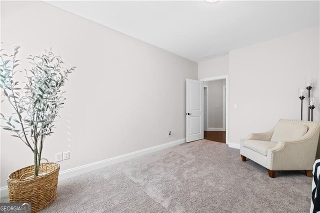 unfurnished room featuring carpet flooring