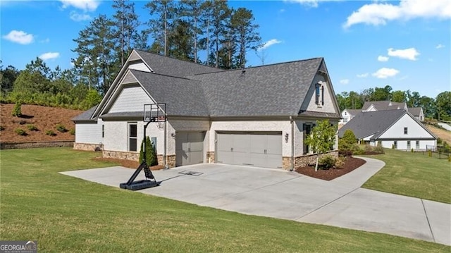 view of front facade featuring a garage and a front lawn