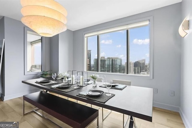 dining room featuring light hardwood / wood-style flooring