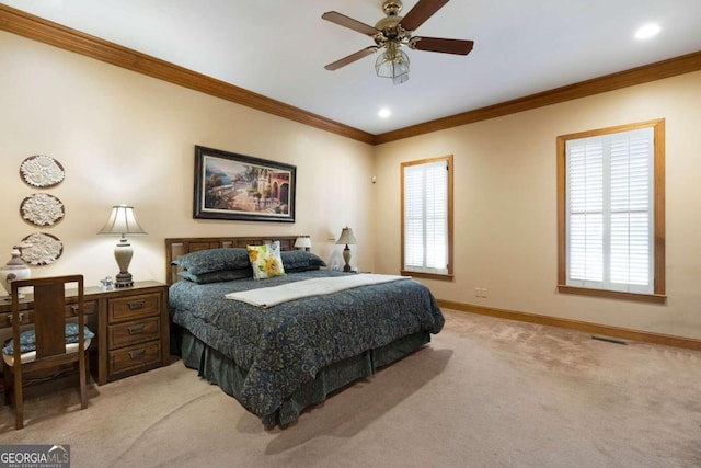 bedroom featuring light colored carpet, multiple windows, crown molding, and ceiling fan