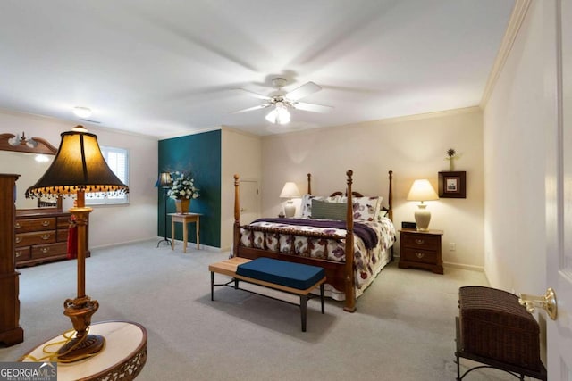 bedroom with ceiling fan, crown molding, and light carpet