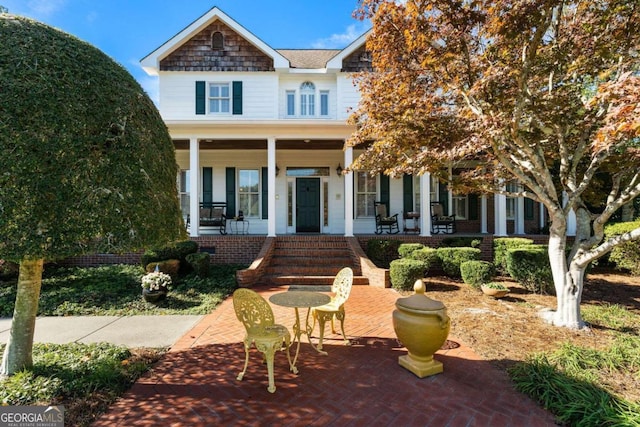 view of front of home featuring covered porch