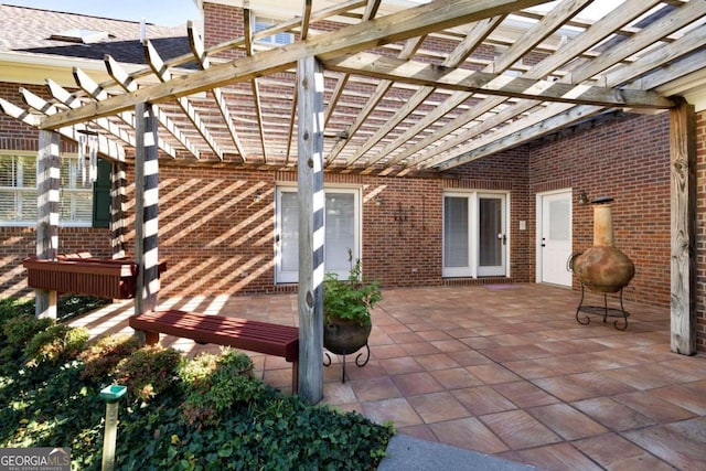 view of patio featuring a pergola