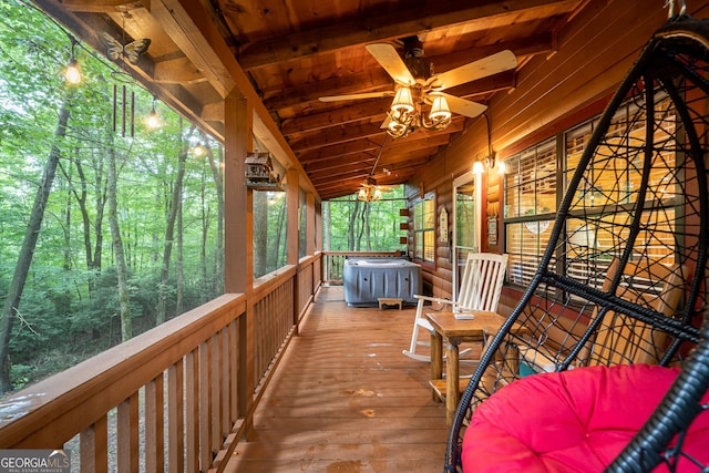 wooden deck featuring ceiling fan