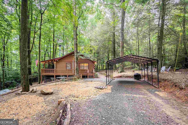 exterior space featuring a carport