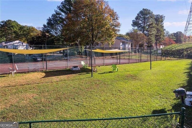 view of yard featuring tennis court