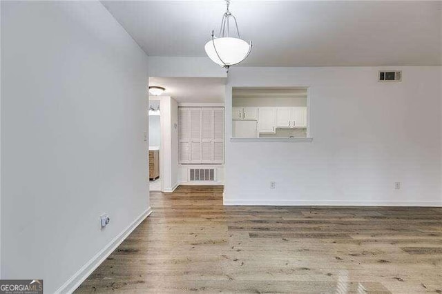 interior space featuring wood-type flooring